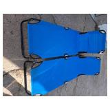 2 blue lounge chairs