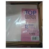 Bin of scrapbook/album sheets, tape and supplies