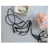 Assortment of xlr, 3.5, 1/4" audio cables and adapters.