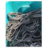 Assortment of xlr, 3.5, 1/4" audio cables and adapters.