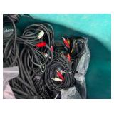 Assortment of xlr, 3.5, 1/4" audio cables and adapters.