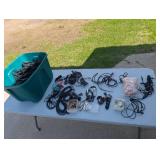Assortment of xlr, 3.5, 1/4" audio cables and adapters.