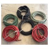 G - Six Solid Rubber Coiled Hoses