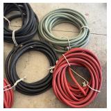 G - Six Solid Rubber Coiled Hoses