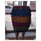 Colorful, Layered Patchwork Skirt Featuring Circular Patterns.