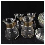 Vintage CorningWare Glass Carafes (Lot of 4) with Black Handles, Gold Bands & Pyrex Dishes
