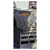 Three Carlisle Tractor Tires on Rusted Rims