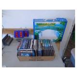 Flat of dvds & electronic picture display. As shown. CASH ON SITE ONLY. PICKUP IS TUESDAY MAY 19TH FROM 11 AM TO 4 PM. REGARDLESS WHAT THE SCHEDULE STATES.