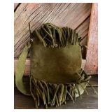 handmade moss green suede leather bohemian-style crossbody bag with fringe detailing.