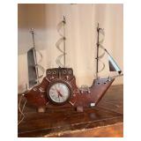Vintage United Clock Corp Ship Clock & Lamp featuring a wooden body and metal sails.