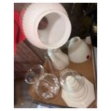 Various vintage lamp shades including white milk glass, a hobnail pattern shade, and a clear shade with etched snowflake designs.