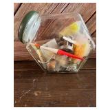 Glass Jar with Various Fishing Tackle