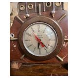 Vintage United Clock Corp Ship Clock & Lamp featuring a wooden body and metal sails.