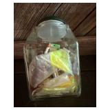Glass Jar with Various Fishing Tackle