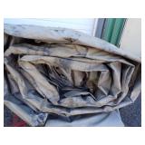 Large Tarp Good for Woodpile may have holes or rips