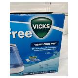 NEW in box Vicks Filter-Free Cool Mist Humidifier. Low maintenance, no filters to replace! Large 1-gallon tank runs 18-24 hours. Features a VapoPad heater for soothing menthol scent. Perfect for mediu