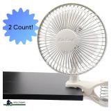 Lot of 2 Air King 6" Clip-On Fans. Commercial-grade personal fans with 2 quiet speeds. Features a heavy-duty, spring-loaded clip and tilting head for custom airflow. Durable, compact design—ideal fo