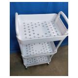 White 3-tier rolling utility cart with a perforated tray design