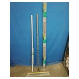 Push Broom,  Vigoro Sturdy Bamboo Plant Stakes pack, and a Cord Hiding Track