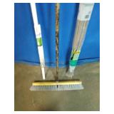 Push Broom,  Vigoro Sturdy Bamboo Plant Stakes pack, and a Cord Hiding Track