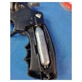 Crosman Vigilante CO2 revolver air pistol accompanied by two tins of .177 caliber Premier pellets.
