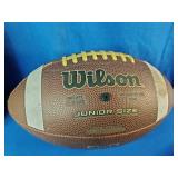 Moccasins, Football, Golf Club Covers, and a Racket Ball Racket