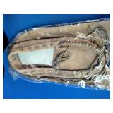 Moccasins, Football, Golf Club Covers, and a Racket Ball Racket