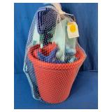 Brand New This is a Sunny Days beach bucket set in red containing five pieces of silicone sand toys.
