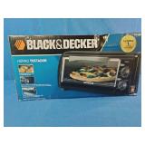 Black & Decker TRO490B 4-slice countertop toaster oven.