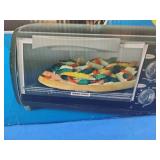 Black & Decker TRO490B 4-slice countertop toaster oven.