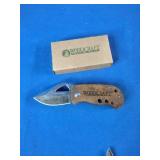 Woodcraft folding pocket knife featuring a wooden handle with the brand logo.