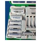 Panasonic Eneloop Power Pack Kit featuring rechargeable batteries, a charger, and plastic storage case.