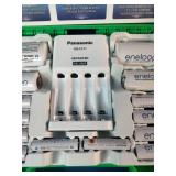 Panasonic Eneloop Power Pack Kit featuring rechargeable batteries, a charger, and plastic storage case.