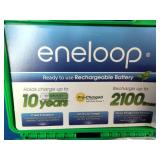 Panasonic Eneloop Power Pack Kit featuring rechargeable batteries, a charger, and plastic storage case.