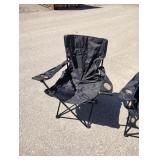 Two new lawn chairs with cases and cup holders