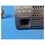 Microsoft Xbox 360 Elite console in black.