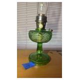 Antique Aladdin oil lamp, footed green base