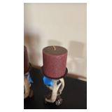(2) Antler pillar candle holders with candles.