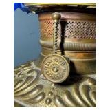 Antique oil lamp with handpainted base and chimney