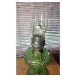 Antique Aladdin oil lamp, footed green base
