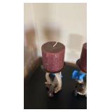 (2) Antler pillar candle holders with candles.