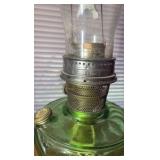 Antique Aladdin oil lamp, footed green base