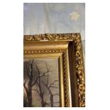 Ornate framed oil painting of a winter setting, signed