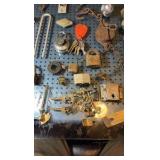 Assorted metal items. brass locks and keys etc.
