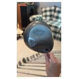 Golf clubs with Titleist golf bag