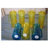 Pitchers with glasses...
