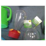 Hummingbird feeders and watering ca...