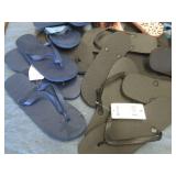 Lot of assorted flip flops...