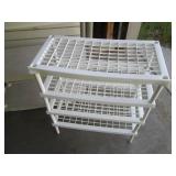 Pair of plastic shelving units in a...