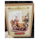 Grandeur Noel Porcelain Santa On Wheels Collector